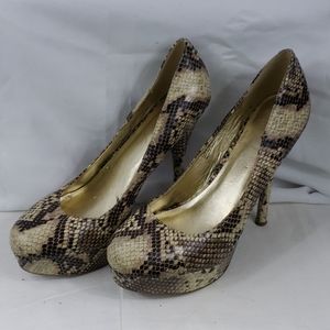 Zigi Soho faux snakeskin closed toe platform pump